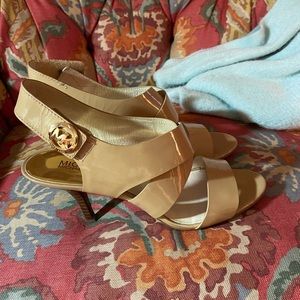Michael Kors nude color patent leather sandals with Velcro closure. Size 8M